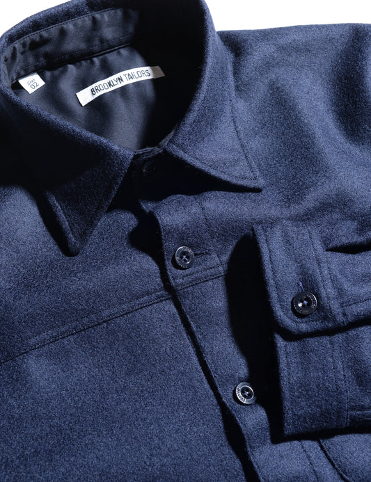 Detail of BKT15 Shirt Jacket in Boiled Wool - Navy showing collar, cuff, and buttons