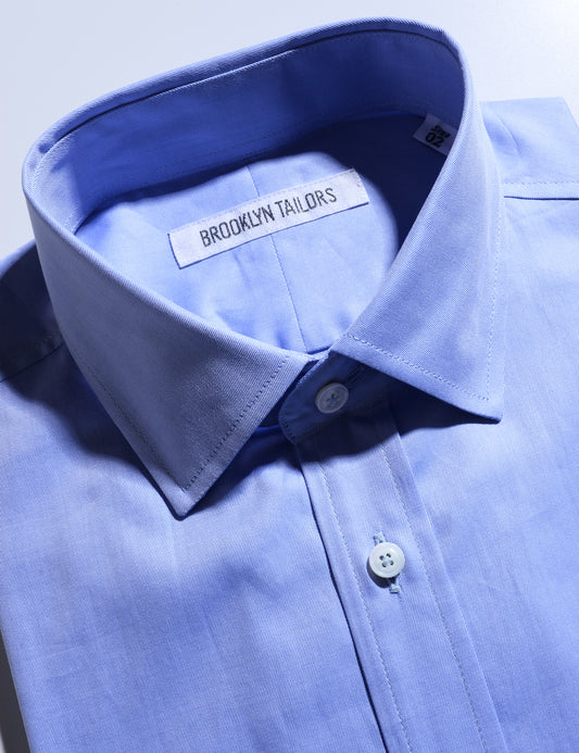 Detail shot of collar and placket of Brooklyn Tailors BKT20 Slim Dress Shirt in Cotton Twill - Blue