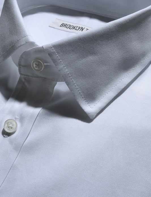 Detail shot showing collar, buttons, and fabric texture on Brooklyn Tailors BKT20 Slim Dress Shirt in Cotton Twill - White