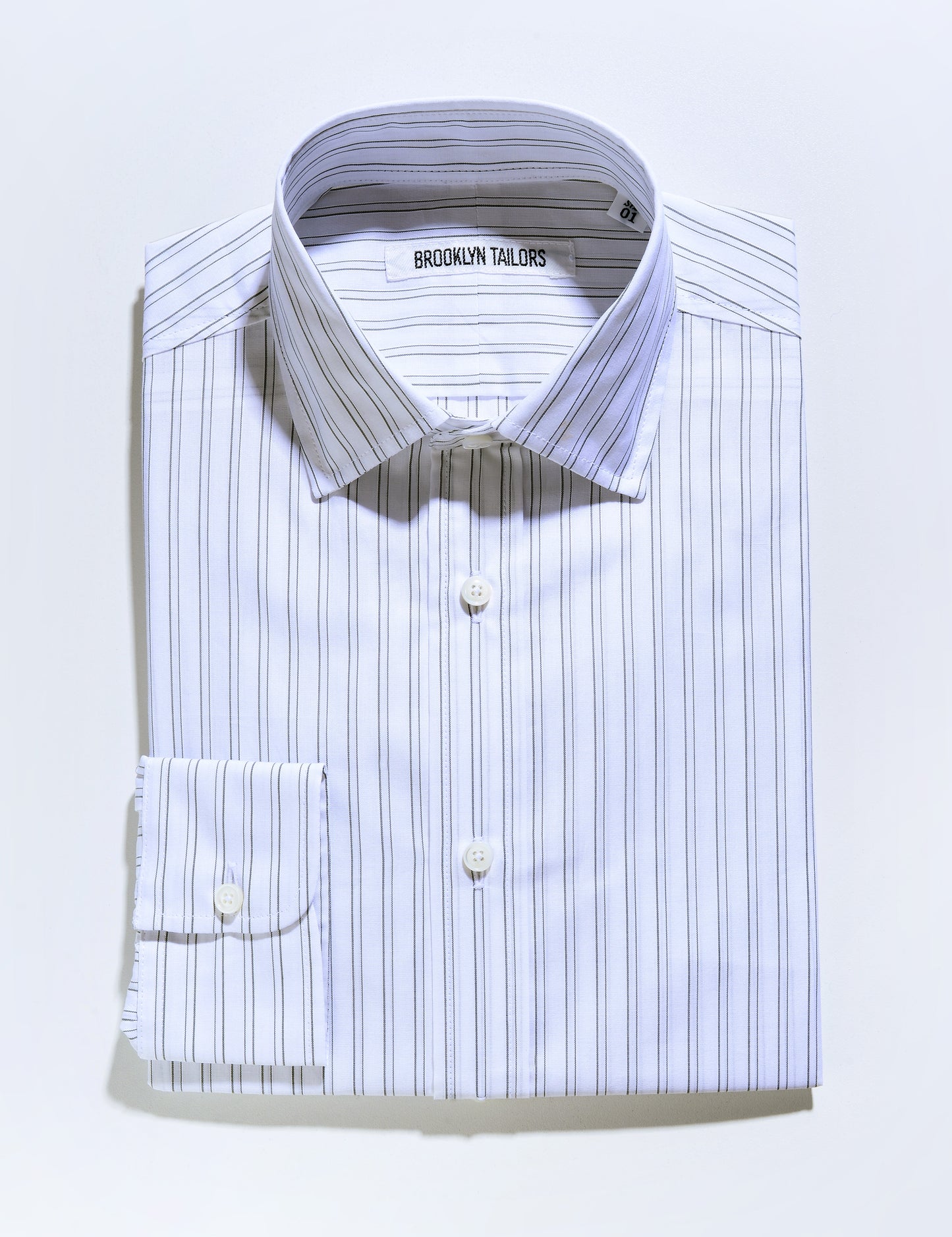 Folded flat shot of Brooklyn Tailors BKT20 Slim Dress Shirt in Twin Stripe - Natural / Green