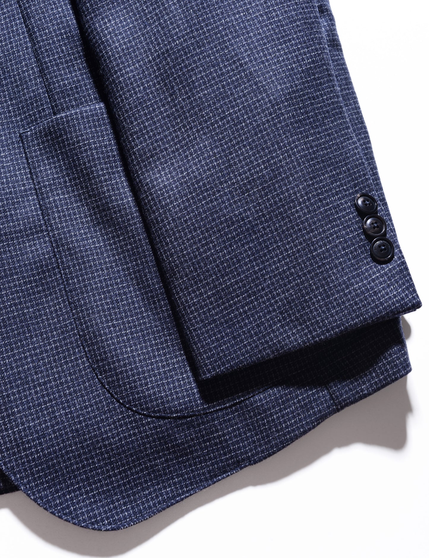 Detail shot of cuff, patch pocket, and fabric pattern on Brooklyn Tailors BKT35 Unstructured Jacket in Brushed Wool Microgrid - Navy
