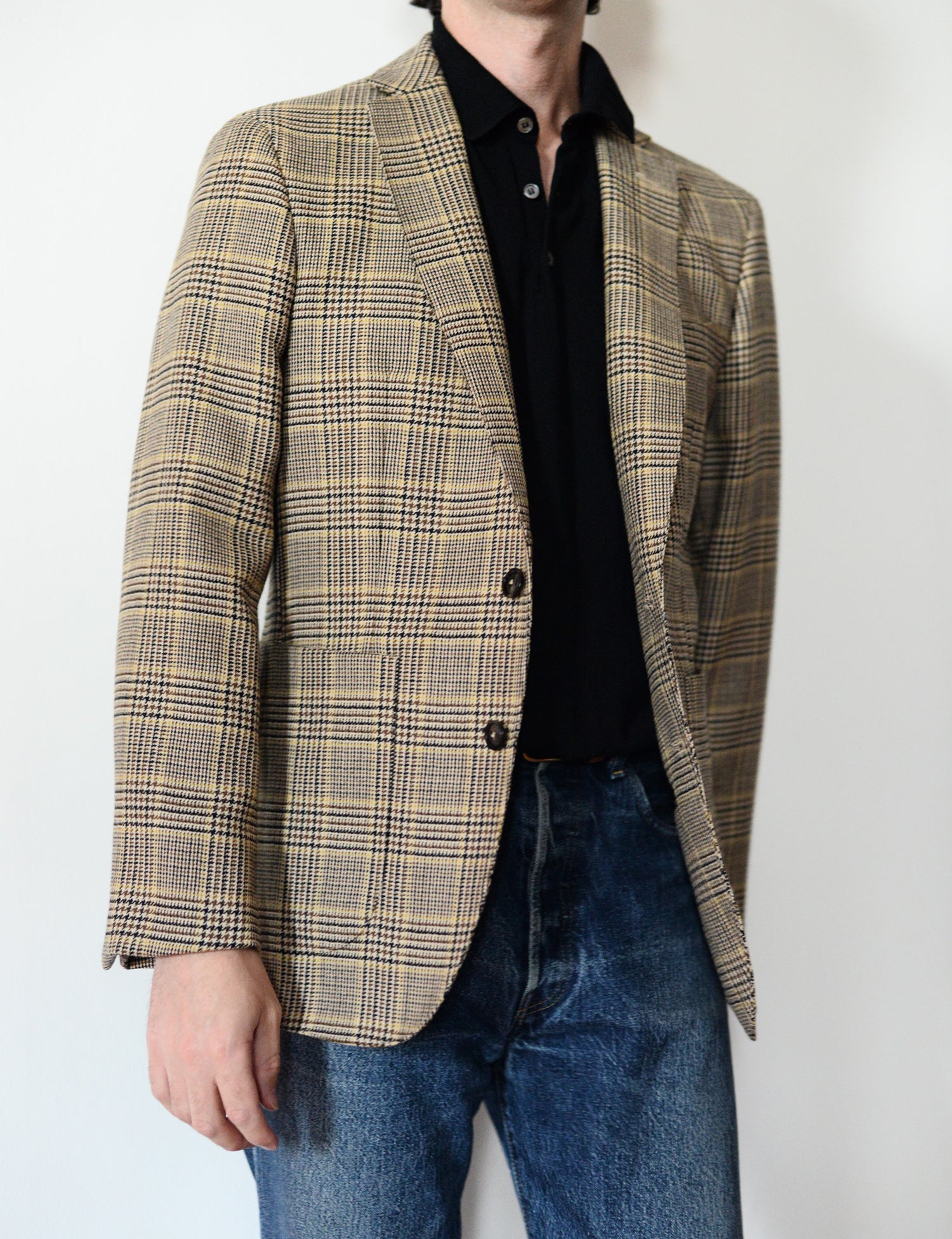 Brooklyn Tailors BKT35 Unstructured Jacket in Vintage Wool - English Plaid on-body shot. Model is wearing the jacket with a black polo and jeans