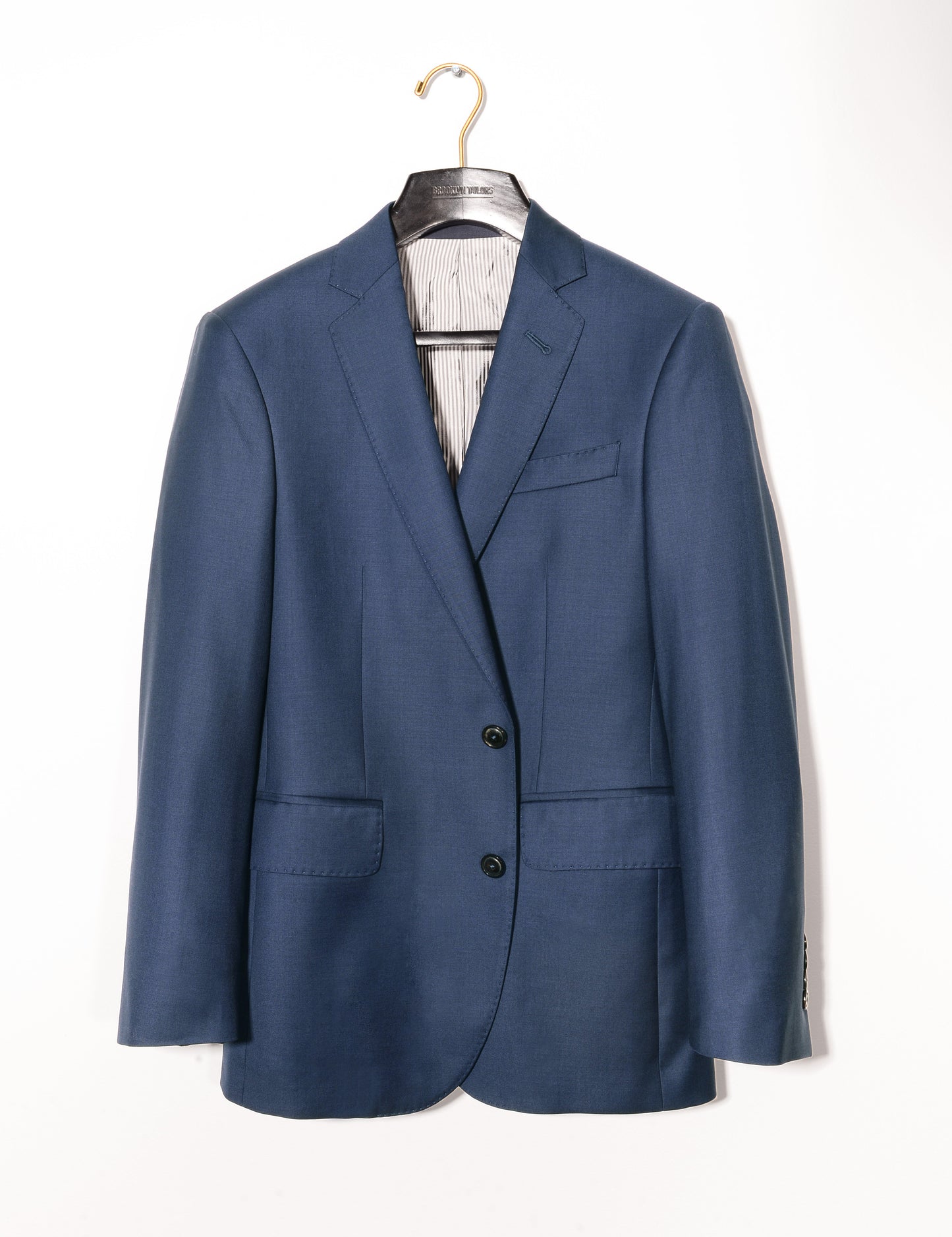 Brooklyn Tailors BKT50 Tailored Jacket in Super 120s Twill - Bright Navy full length shot on hanger