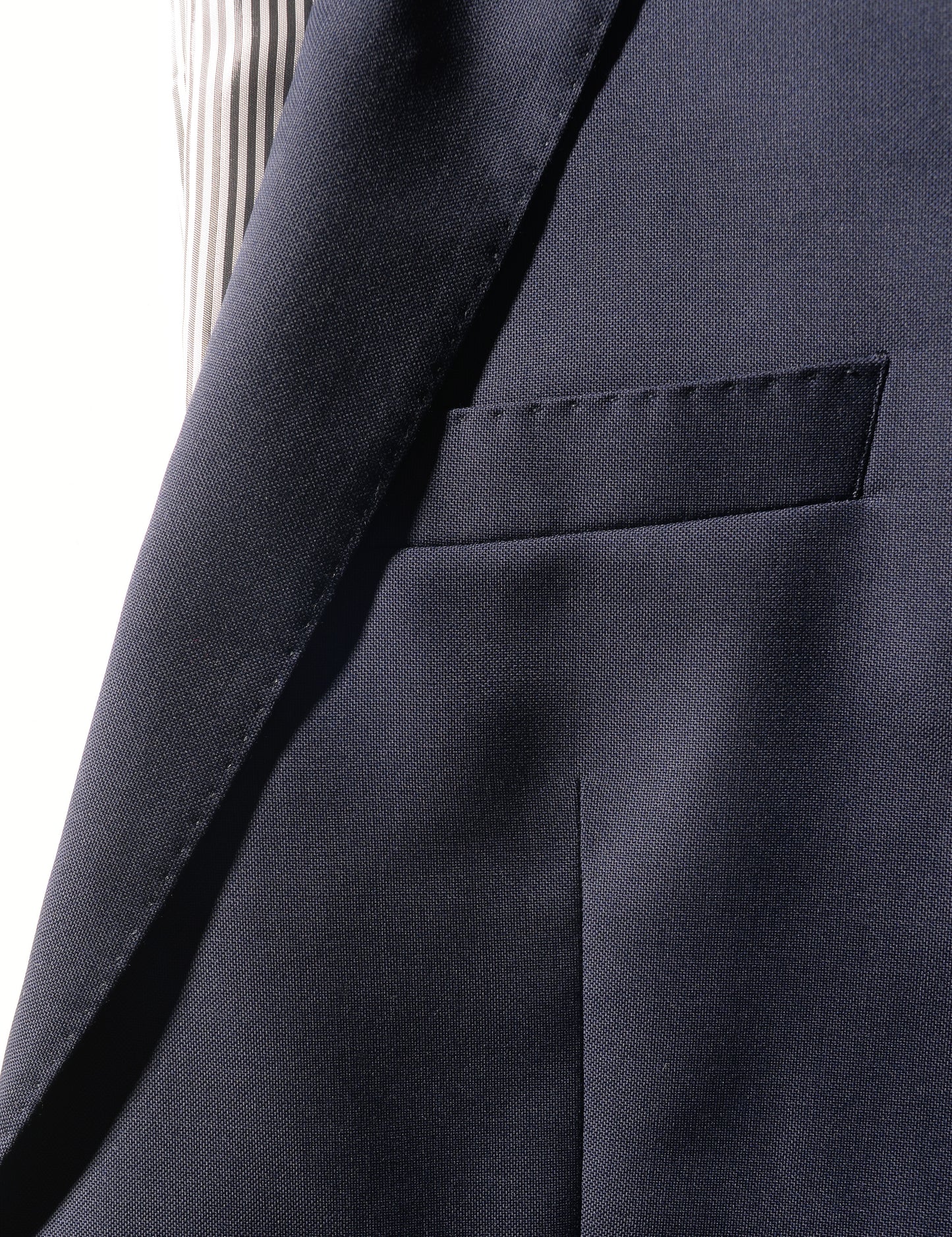 Detail shot of Brooklyn Tailors BKT50 Tailored Jacket in Super 110s Plainweave - Classic Navy showing lapel and chest pocket