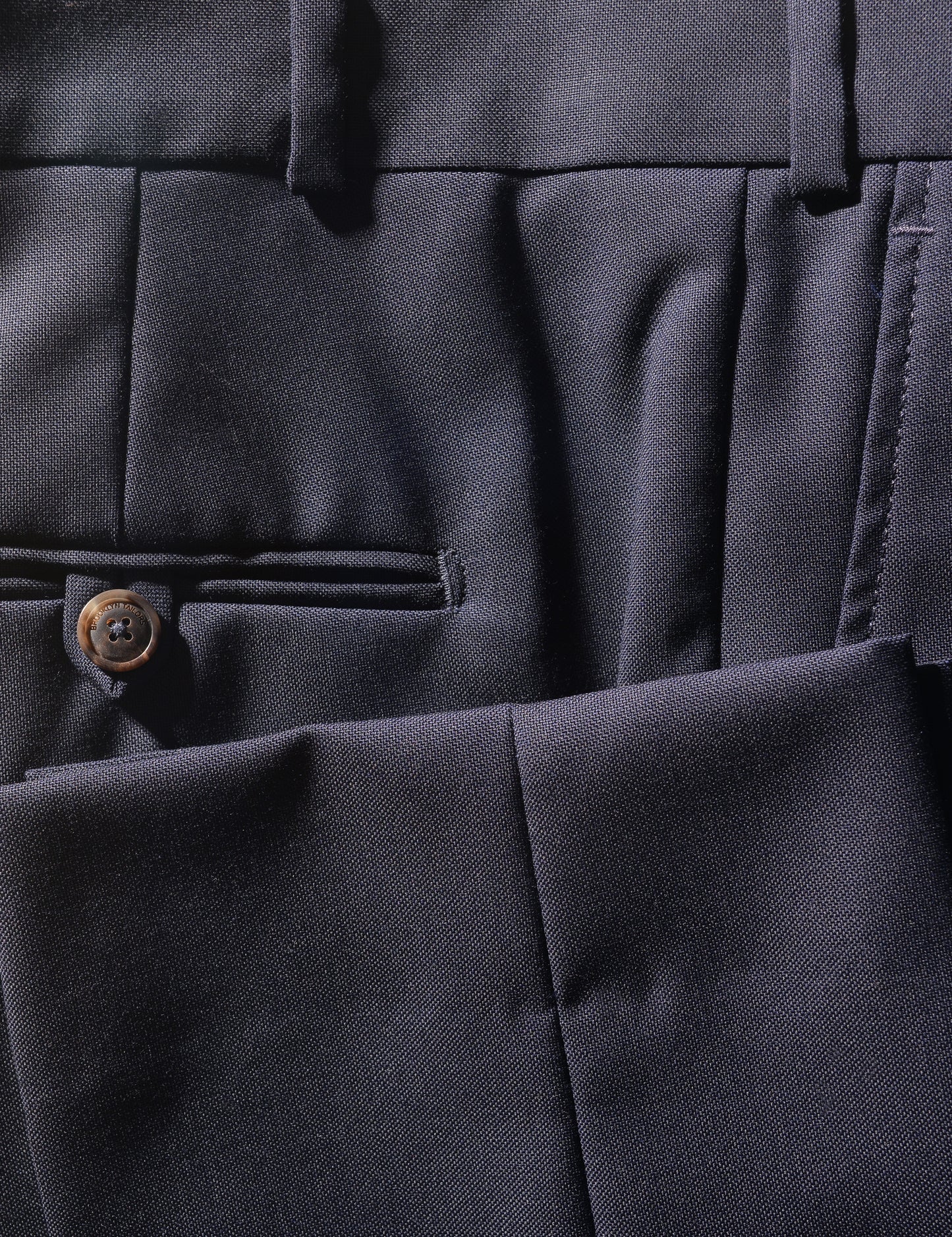 Detail shot of Brooklyn Tailors BKT50 Tailored Trouser in Super 110s Plainweave - Classic Navy showing back pocket and cuff