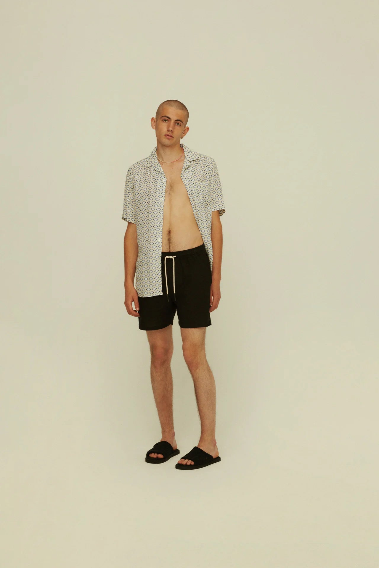 OAS Black Linen Shorts on-body shot from front