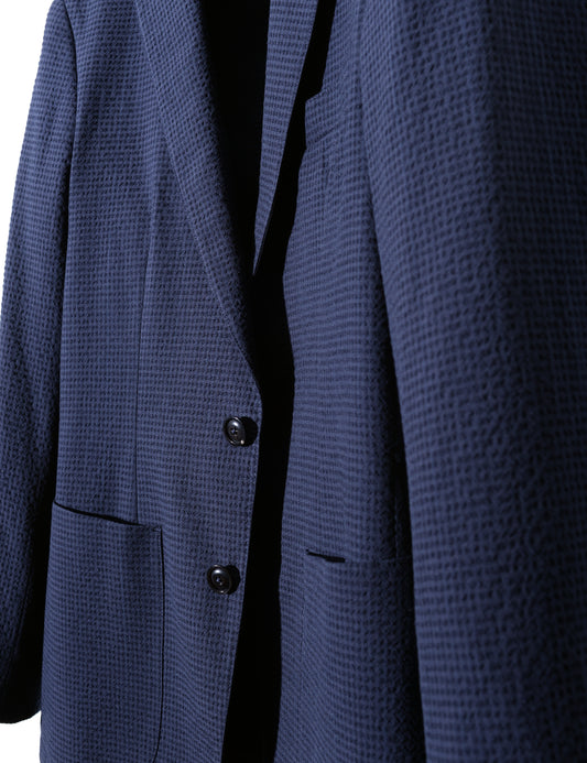 Detail of front of Brooklyn Tailors BKT35 Unstructured Jacket in Crinkled Wool & Cotton - Naval Blue showing fabric texture