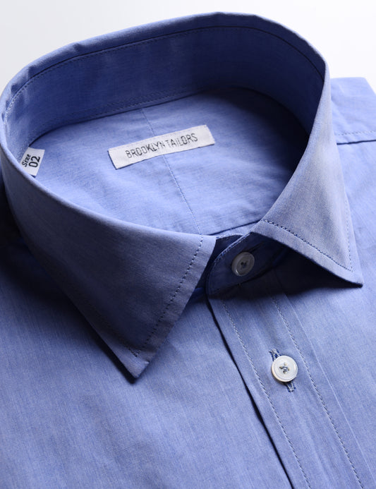 Detail shot of collar, buttons, and fabric texture on Brooklyn Tailors BKT20 Slim Dress Shirt in Cotton Plainweave - Azure