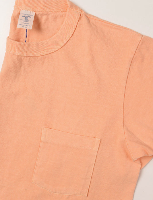 Detail of collar and pocket of Velva Sheen Pigment Pocket Tee in Coral