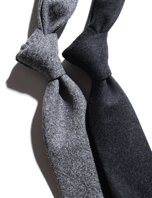 Detail of Super 130s Wool Flannel Tie - Salt & Pepper Gray showing fabric texture