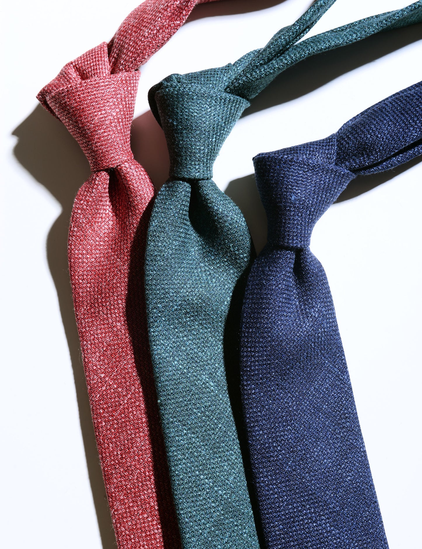 Close-up showing fabric texture of Silk, Wool, and Linen Hopsack Tie - Emerald