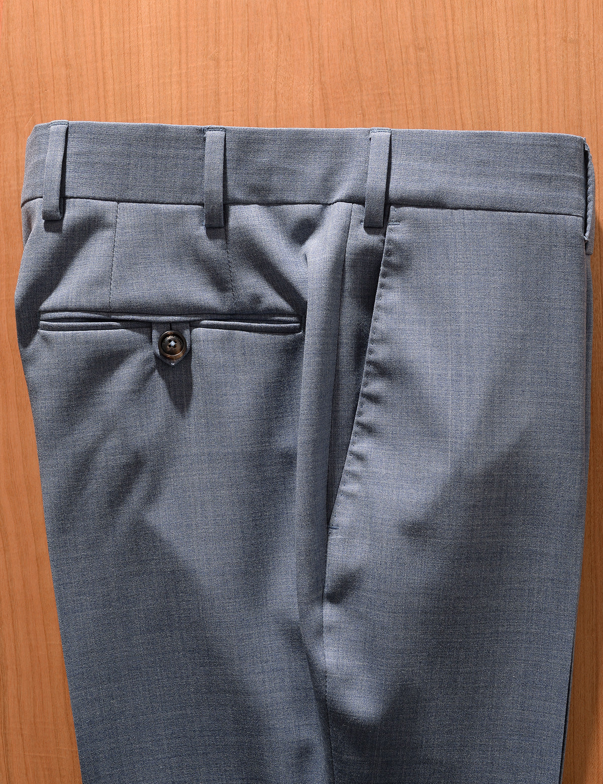 Detail shot of Brooklyn Tailors BKT50 Tailored Trousers in Heathered Plainweave - Summer Sky showing side view of side pocket, back pocket, and waist