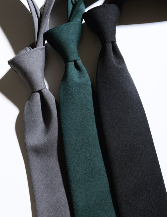 Detail of Wool and Mohair Plainweave Tie - Forest Green showing fabric texture