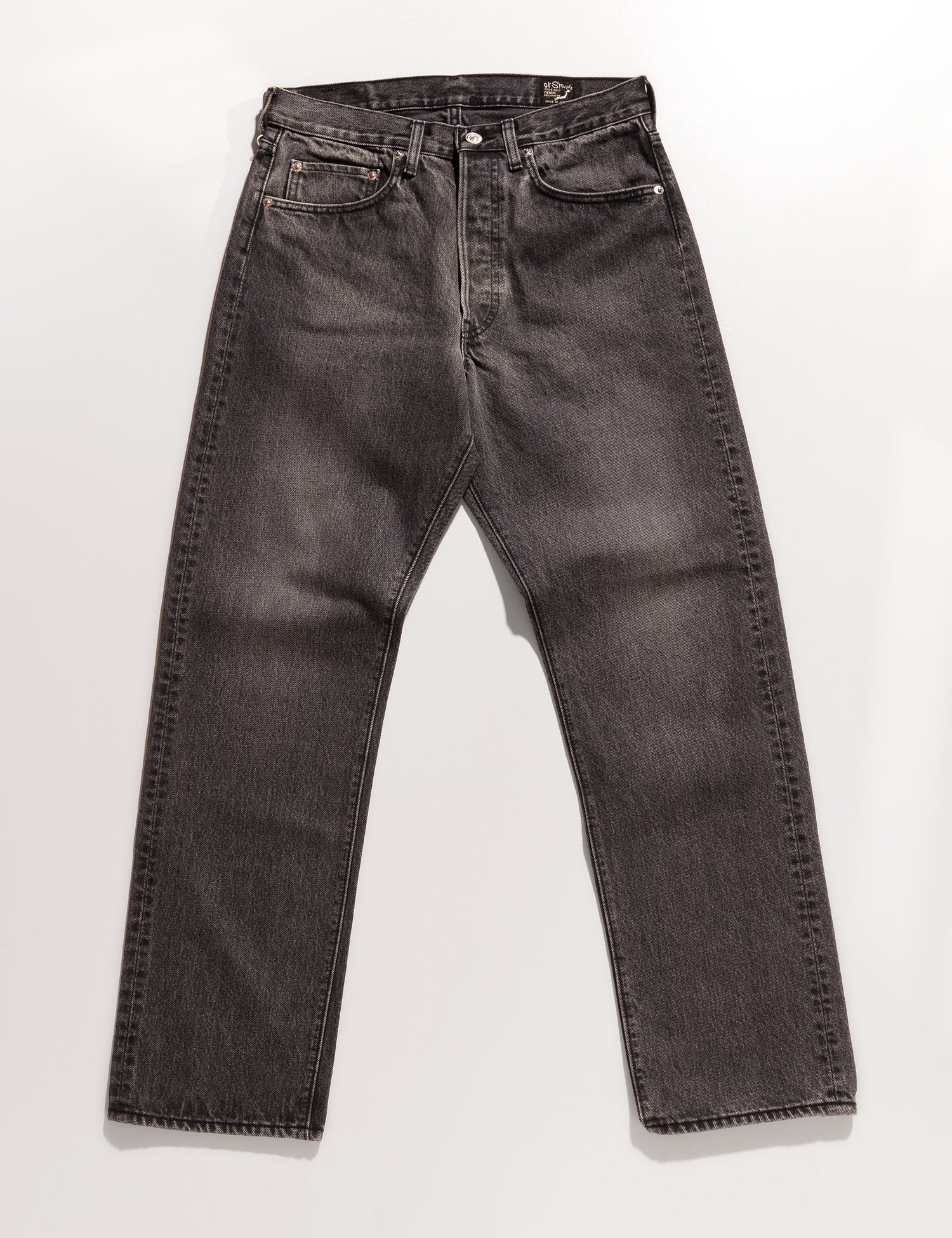 Full length flat shot of Orslow 105 Standard Fit '90s Stonewash Jeans - Black