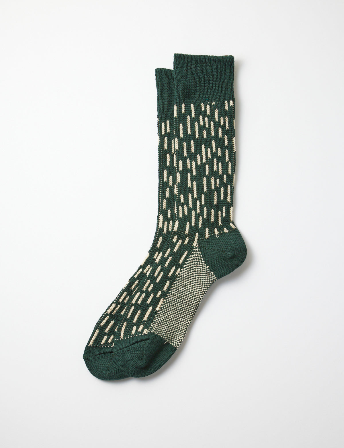 Flat shot of Rototo Raindrop Crew Socks - Dark Green/Ivory