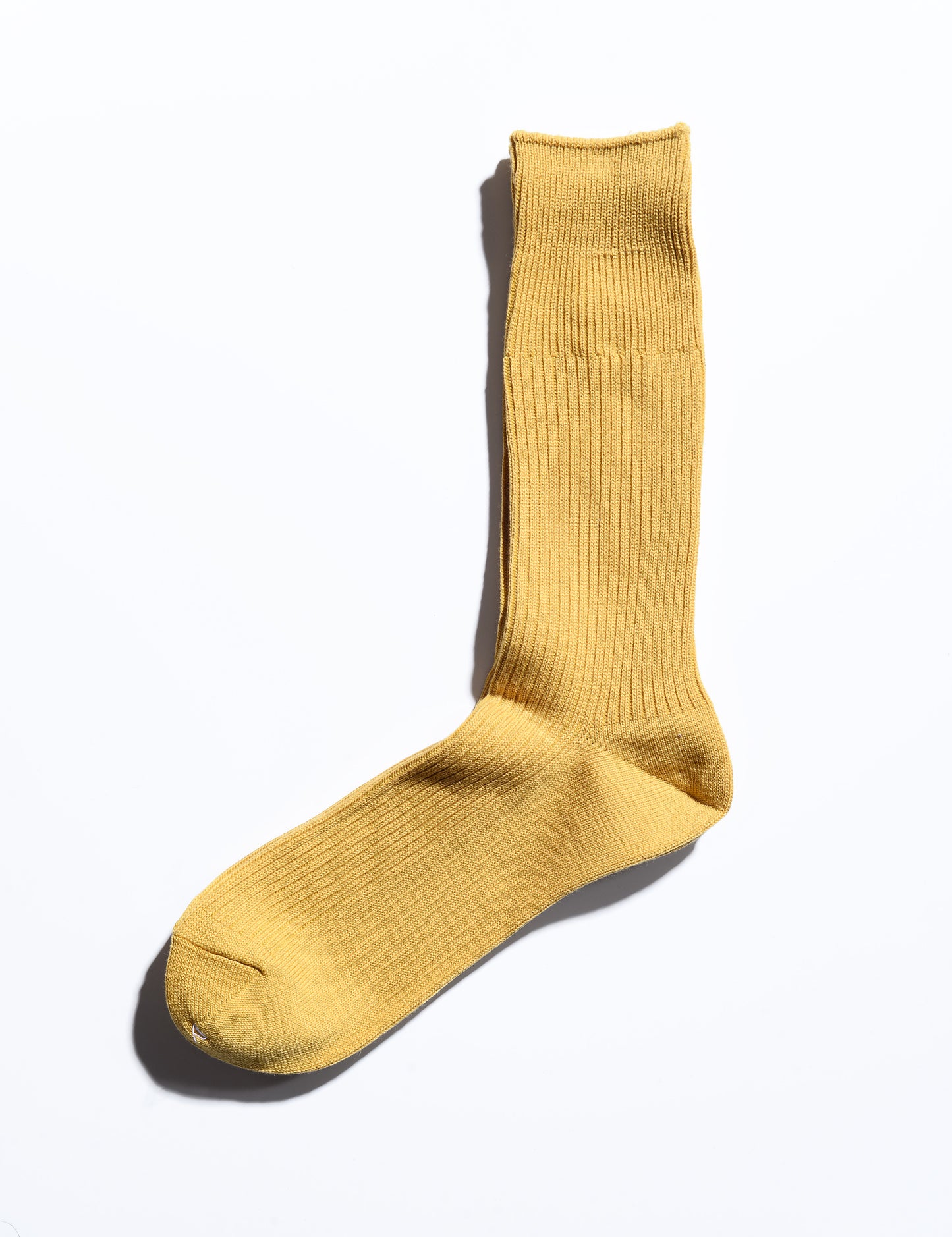 Full length flat shot of Anonymous Ism Brilliant Crew Socks - Dandelion