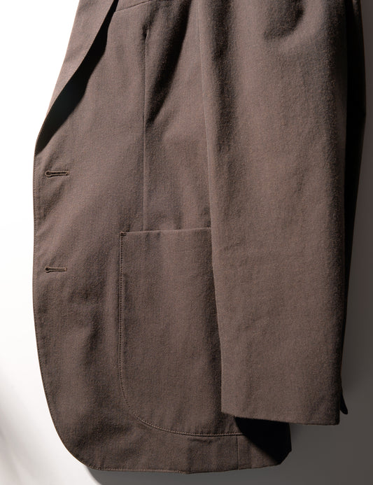 Detail showing cuff, patch pocket, buttonholes, and fabric texture on Brooklyn Tailors BKT35 Unstructured Jacket in Crisp Cotton Blend - Walnut