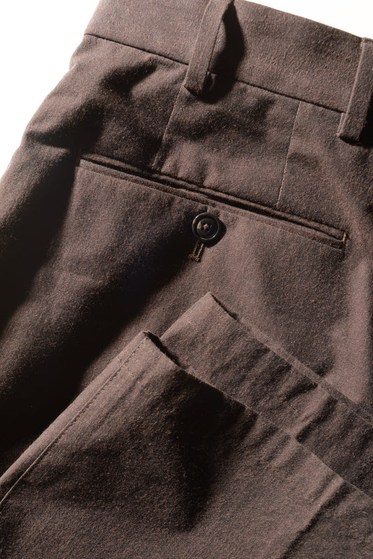 Detail shot of folded Brooklyn Tailors BKT36 Straight Leg Pant in Crisp Cotton Blend - Walnut showing back pocket, waistband, hem and fabric texture