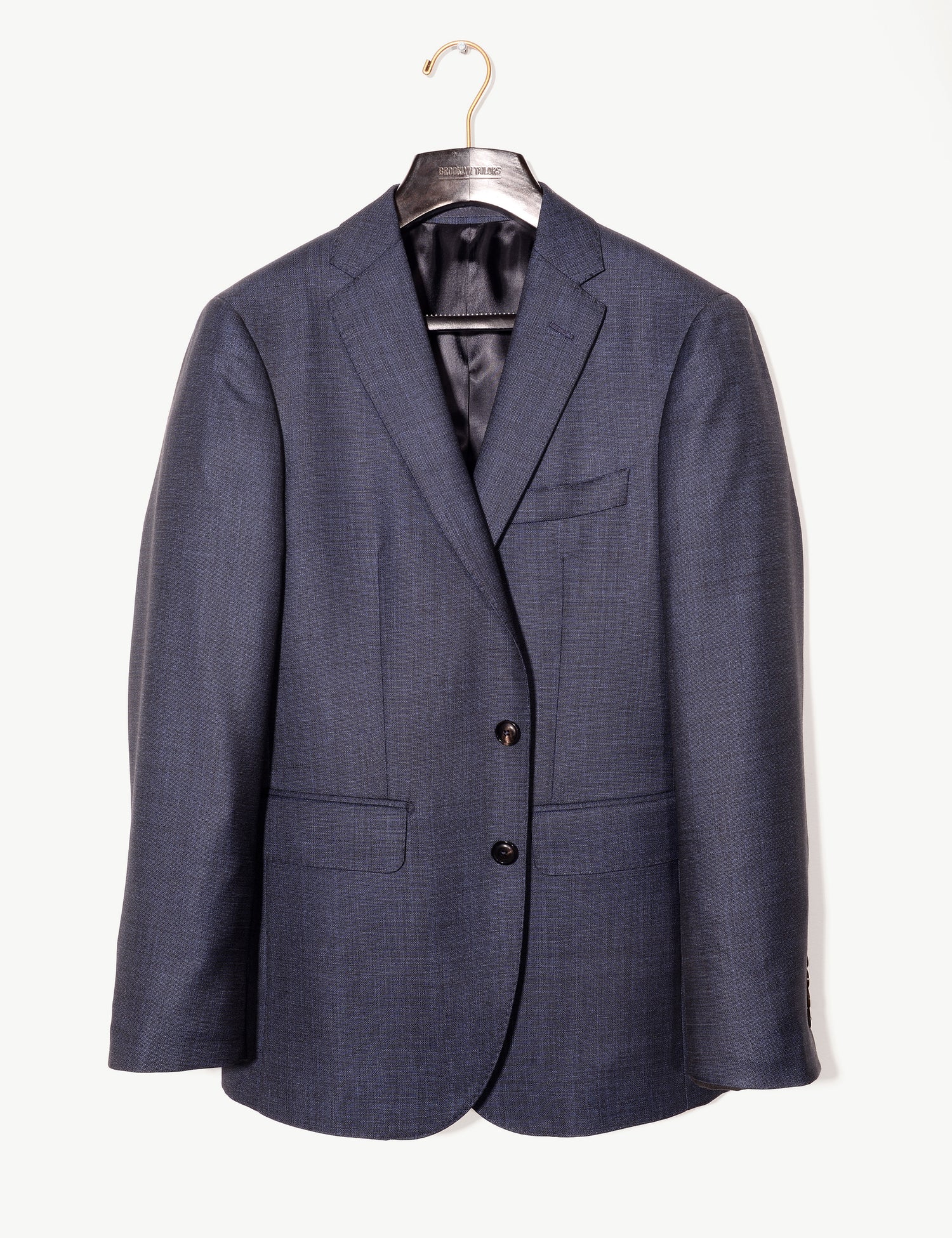 Brooklyn Tailors BKT50 Tailored Jacket in Textured Wool - Deep Sea full length shot on hanger