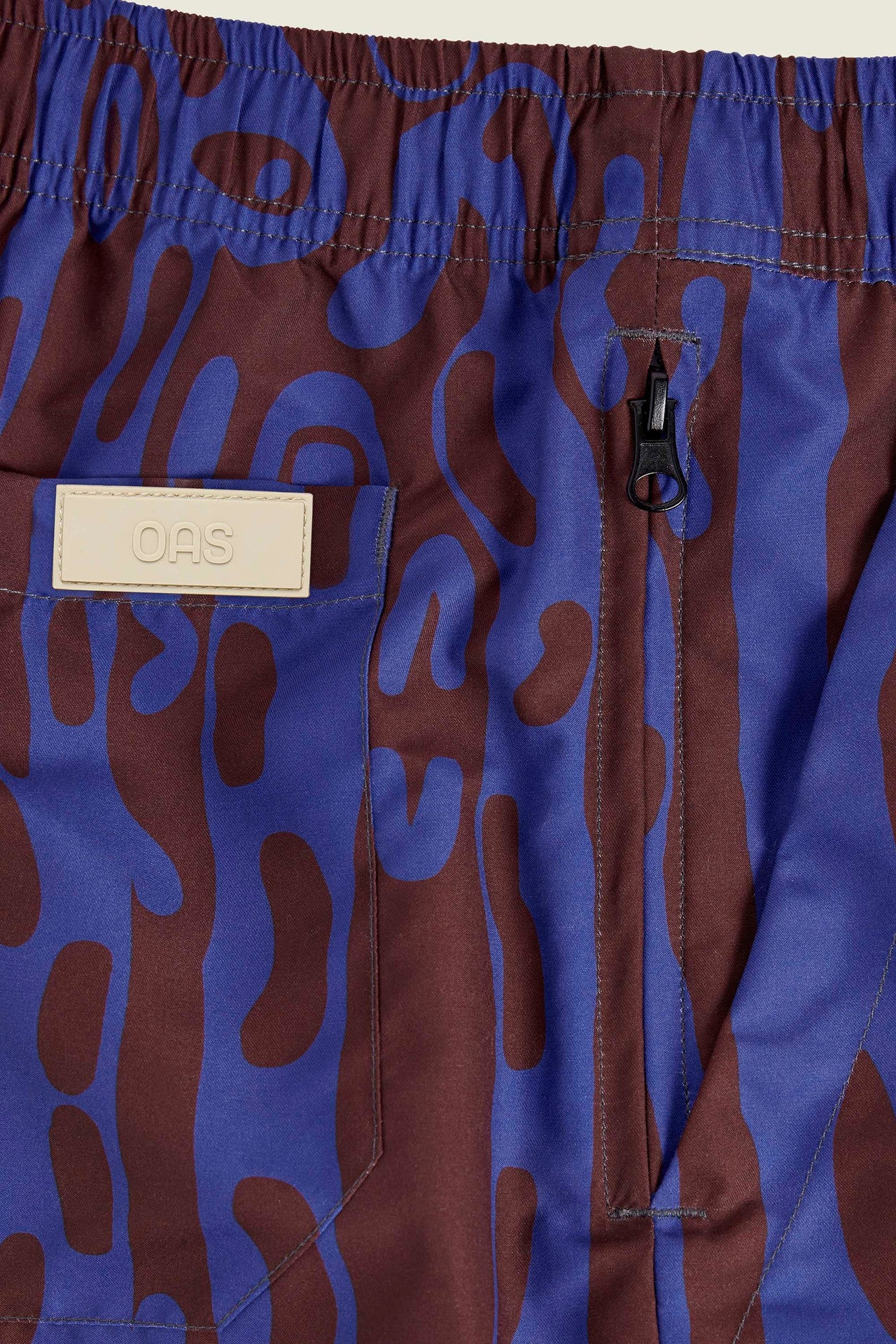 Close-up of OAS Thenards Jiggle Swim Shorts showing pocket and label