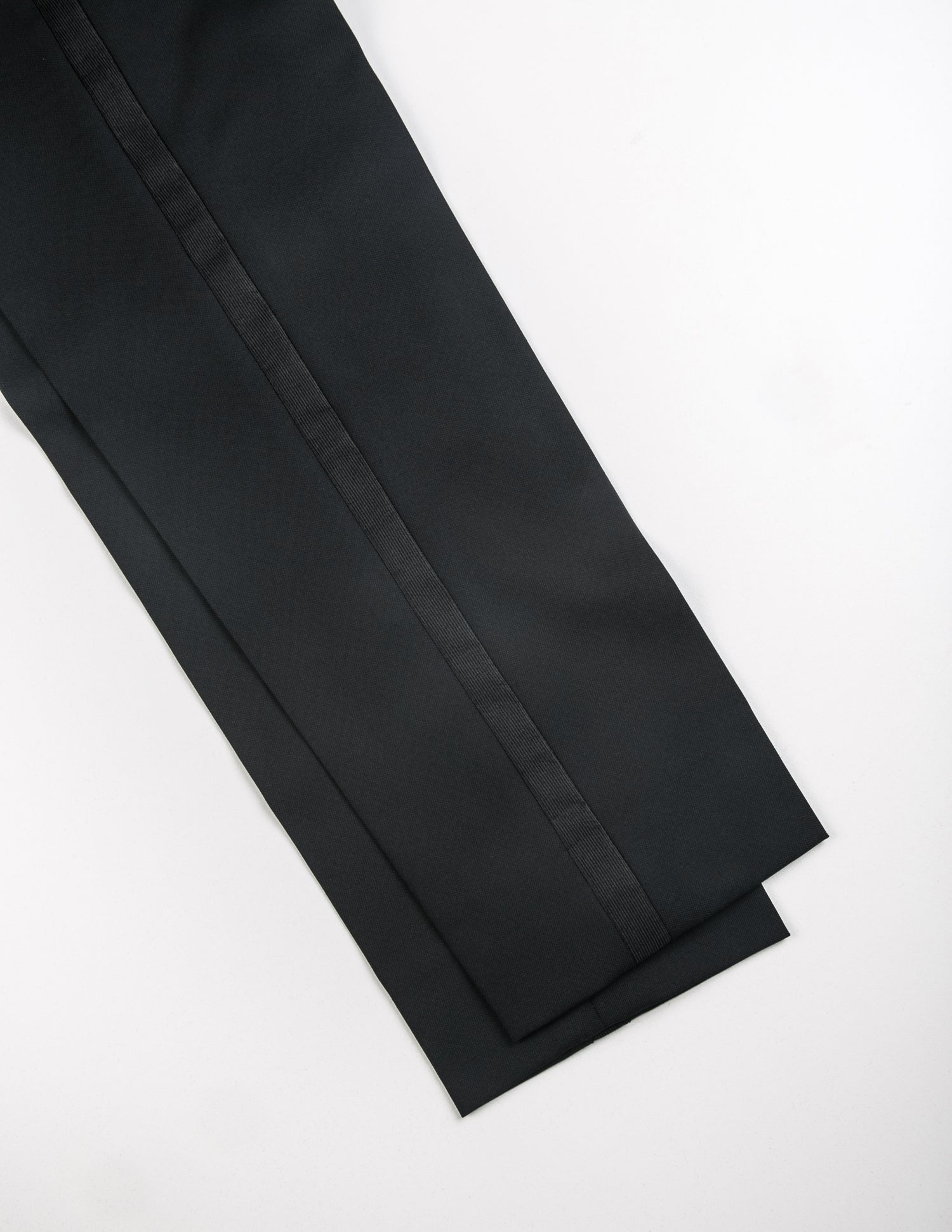 Detail shot of BKT50 Tuxedo Trouser in Super 110s - Black with Grosgrain Stripe showing satin stripe and fabric texture