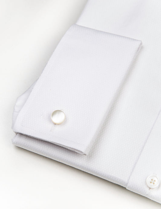 Photo of Genuine Shell Cufflinks - Ivory in a tux shirt