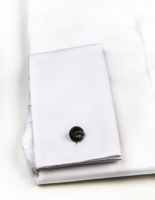 Detail of Genuine Shell Cufflinks - Smoke showing cufflinks in a tuxedo shirt