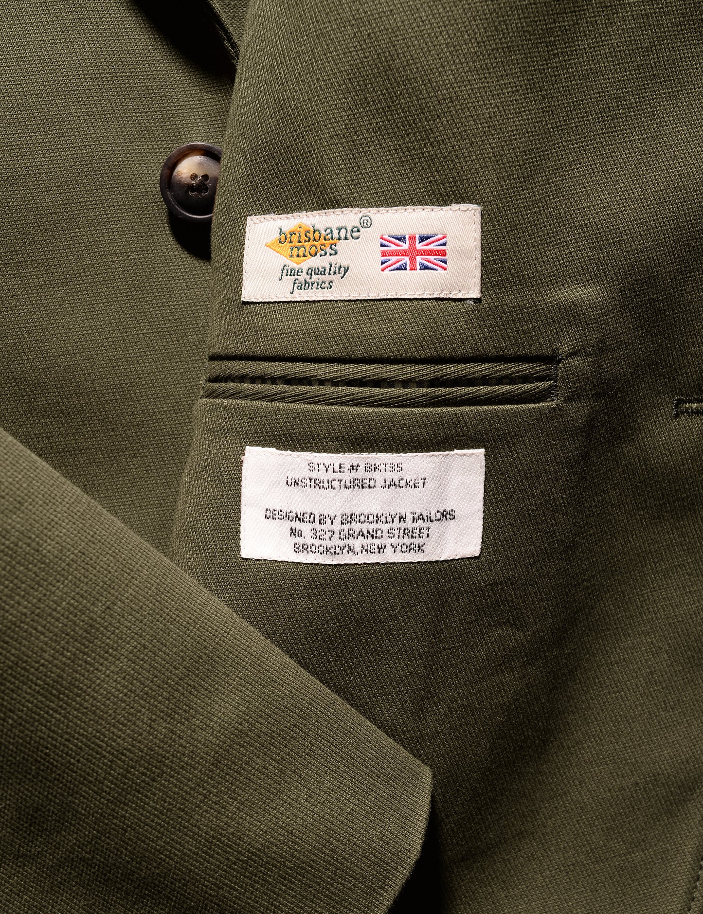 Detail shot showing Brisbane Moss label on interior of Brooklyn Tailors BKT35 Unstructured Jacket in Cavalry Twill - Olive