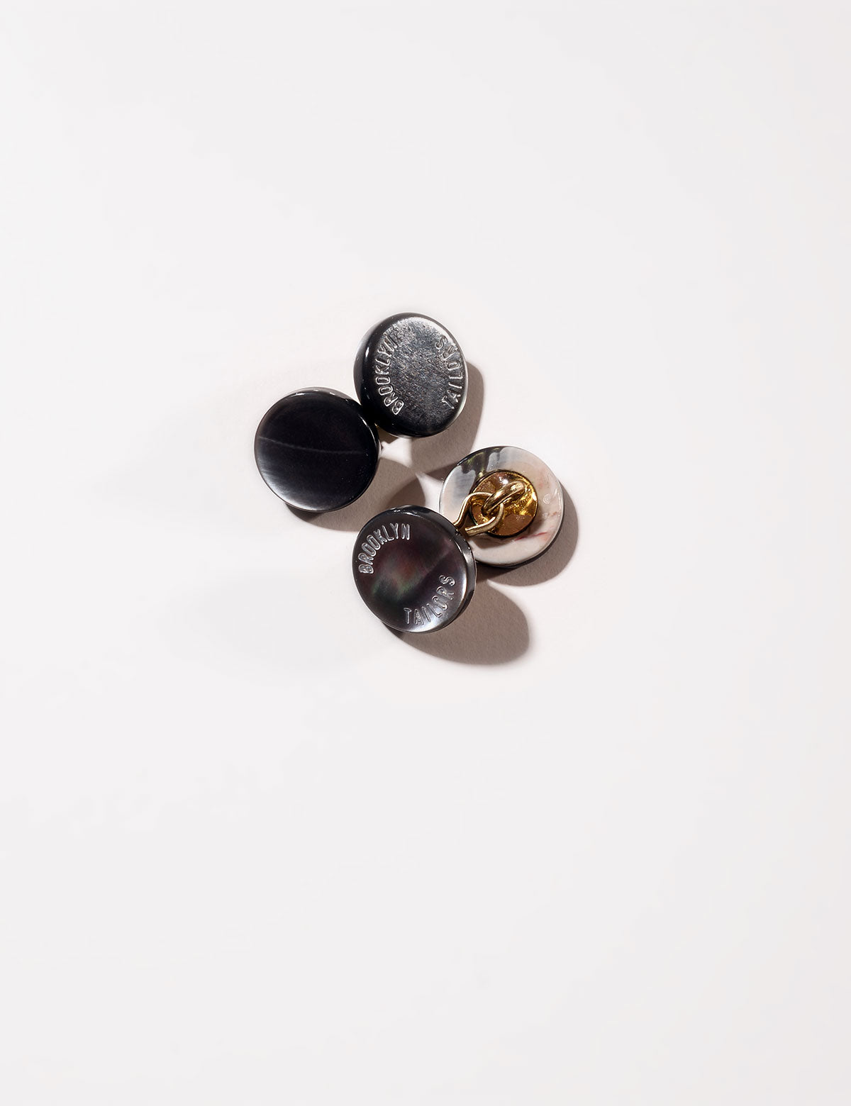 Flat shot of Brooklyn Tailors Genuine Shell Cufflinks - Smoke