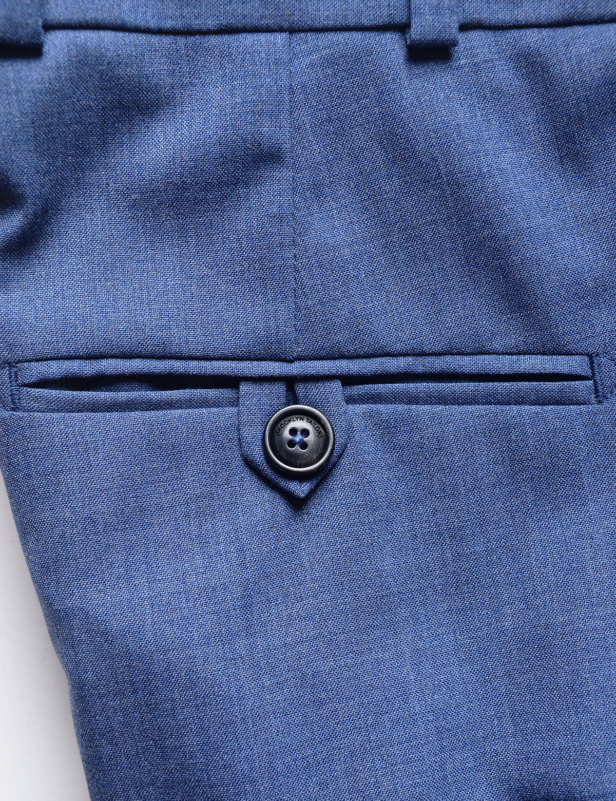 Detail shot of Brooklyn Tailors BKT50 Tailored Trousers in Heathered Wool - San Marino Blue showing back pocket 