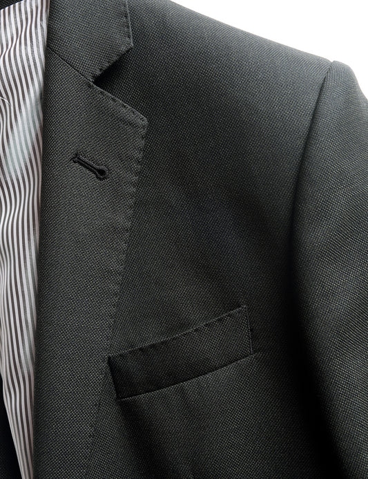 Detail shot of Brooklyn Tailors BKT50 Tailored Jacket in Textured Wool - Wrought Iron showing lapel and chest pocket