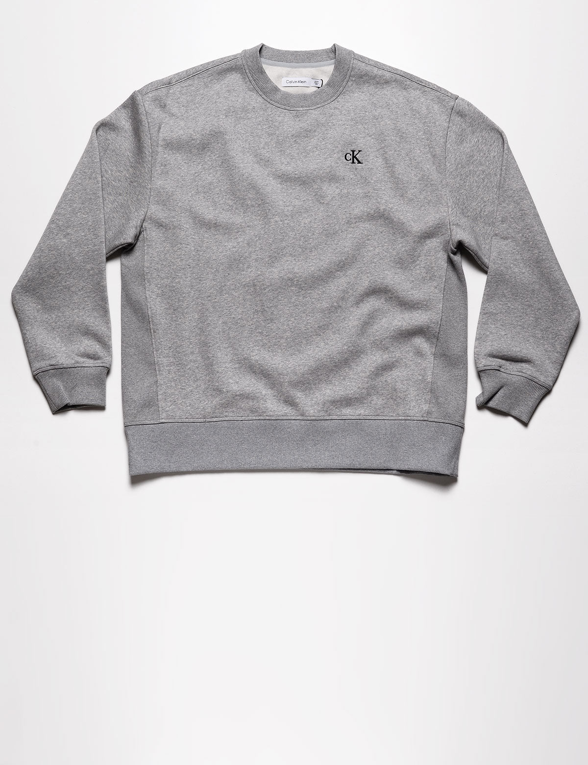 Full length flat shot of Calvin Klein Archive Logo Fleece Crewneck - Heroic Heather Gray