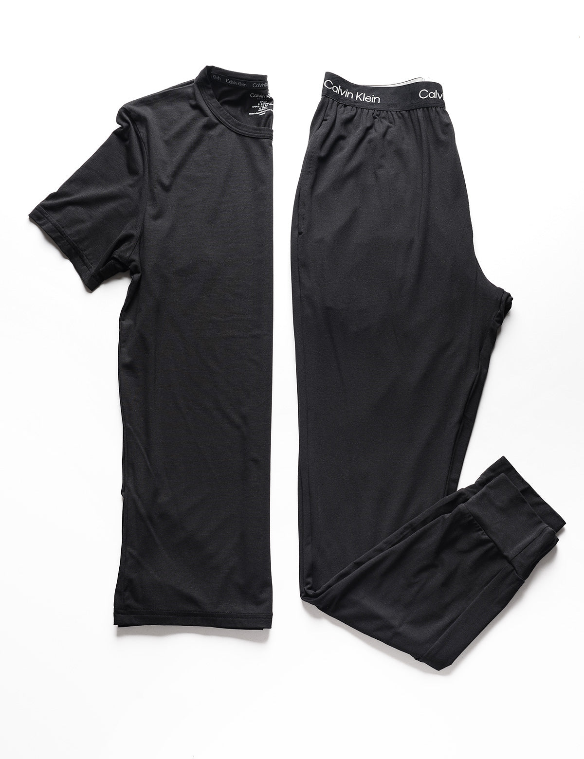 Folded shot of Ultra-Soft Modern Jogger - Black next to black t-shirt
