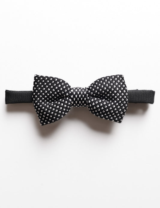 Flat shot of Fumeo Carlo Knit Silk Bowtie in Black with White Caret