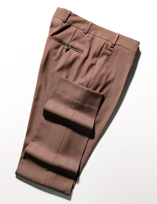 Detail of BKT50 Tailored Trousers in Wool Herringbone - Sepia showing back pocket, fabric weave, and hem