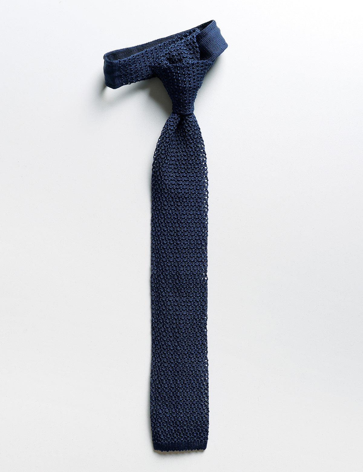 Flat shot of Brooklyn Tailors Italian Silk Knit Tie - Aegean Blue