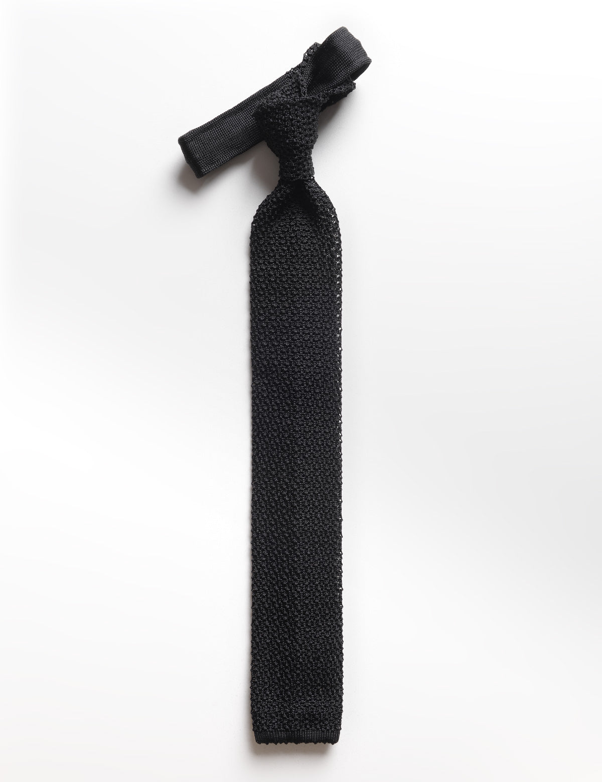 Flat shot of Brooklyn Tailors Italian Silk Knit Tie - Black