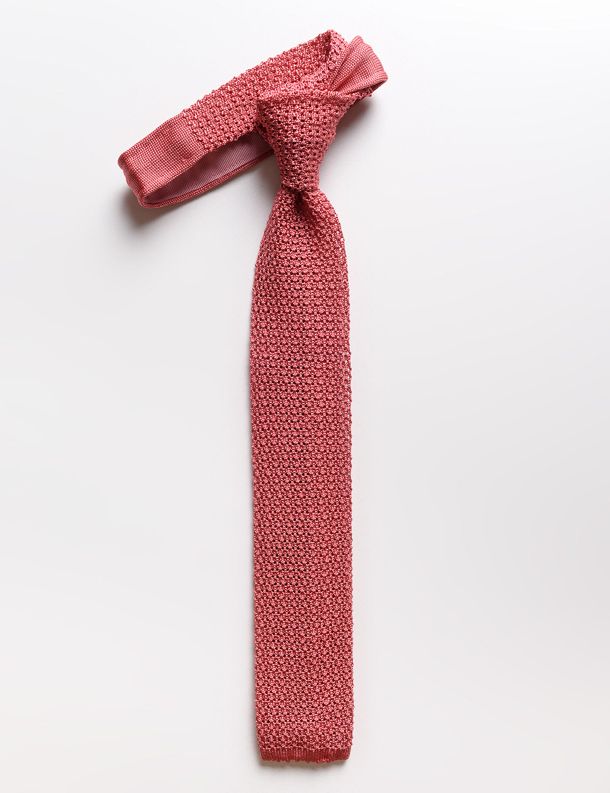 Flat shot of Brooklyn Tailors Italian Silk Knit Tie - Coral