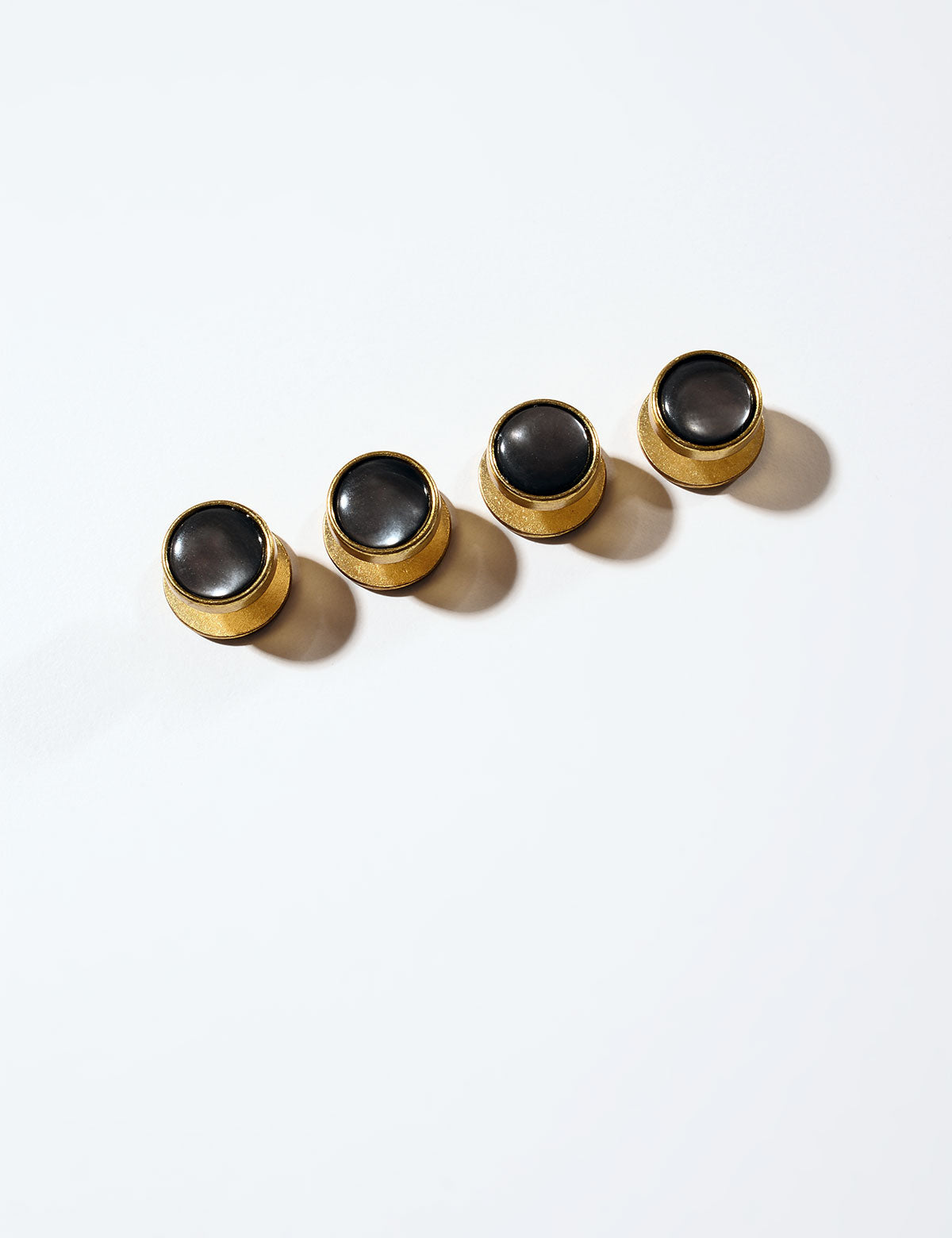 Flat photo of Brooklyn Tailors Smoke Mother of Pearl & Brass Dress Studs