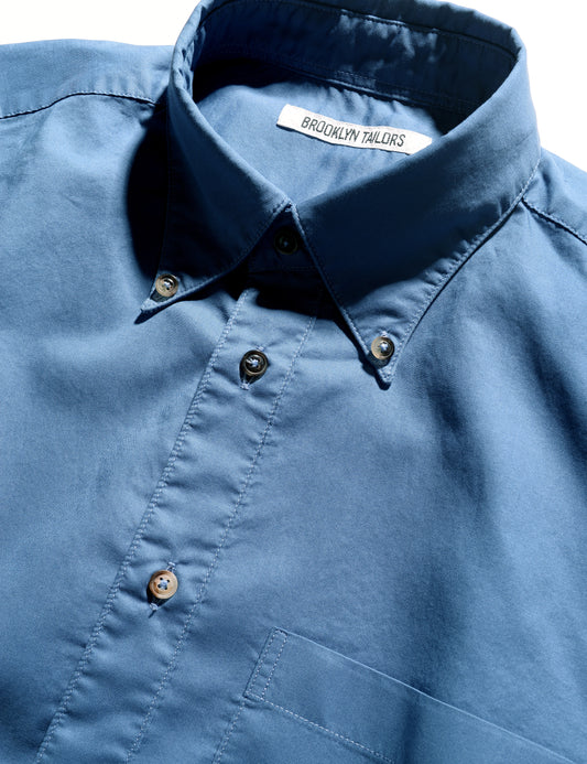 Detail shot of Brooklyn Tailors BKT14 Relaxed Shirt in Smooth Pima Cotton - Delft Blue showing collar, buttons, and fabric