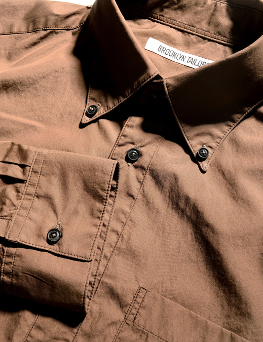 Detail shot of Brooklyn Tailors BKT14 Relaxed Shirt in Supima Cotton Broadcloth - Coffee showing button down collar, cuff, and fabric