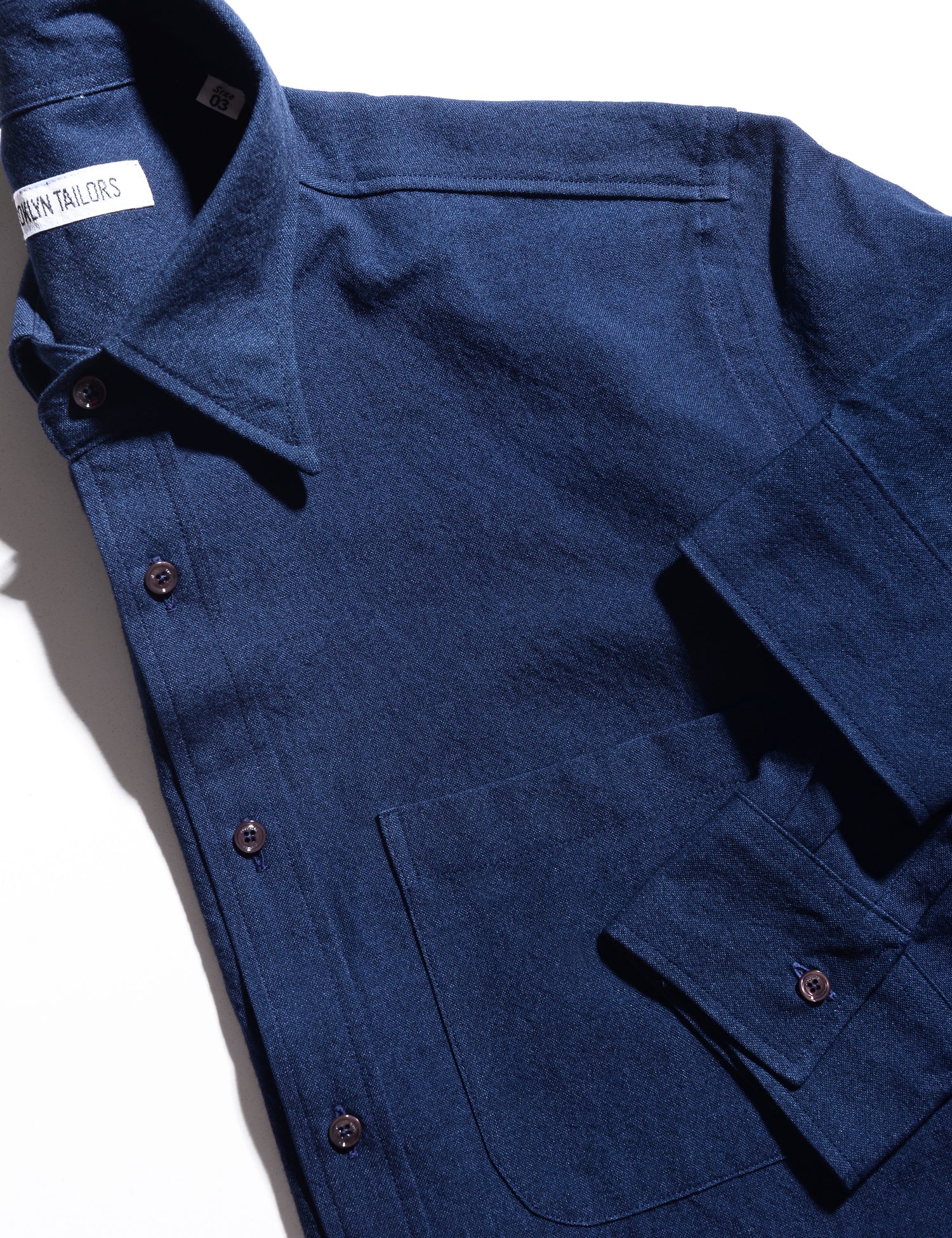 Detail of collar, buttons, and sleeve of Brooklyn Tailors BKT14 Casual Shirt in Sturdy Chambray - Deep Indigo