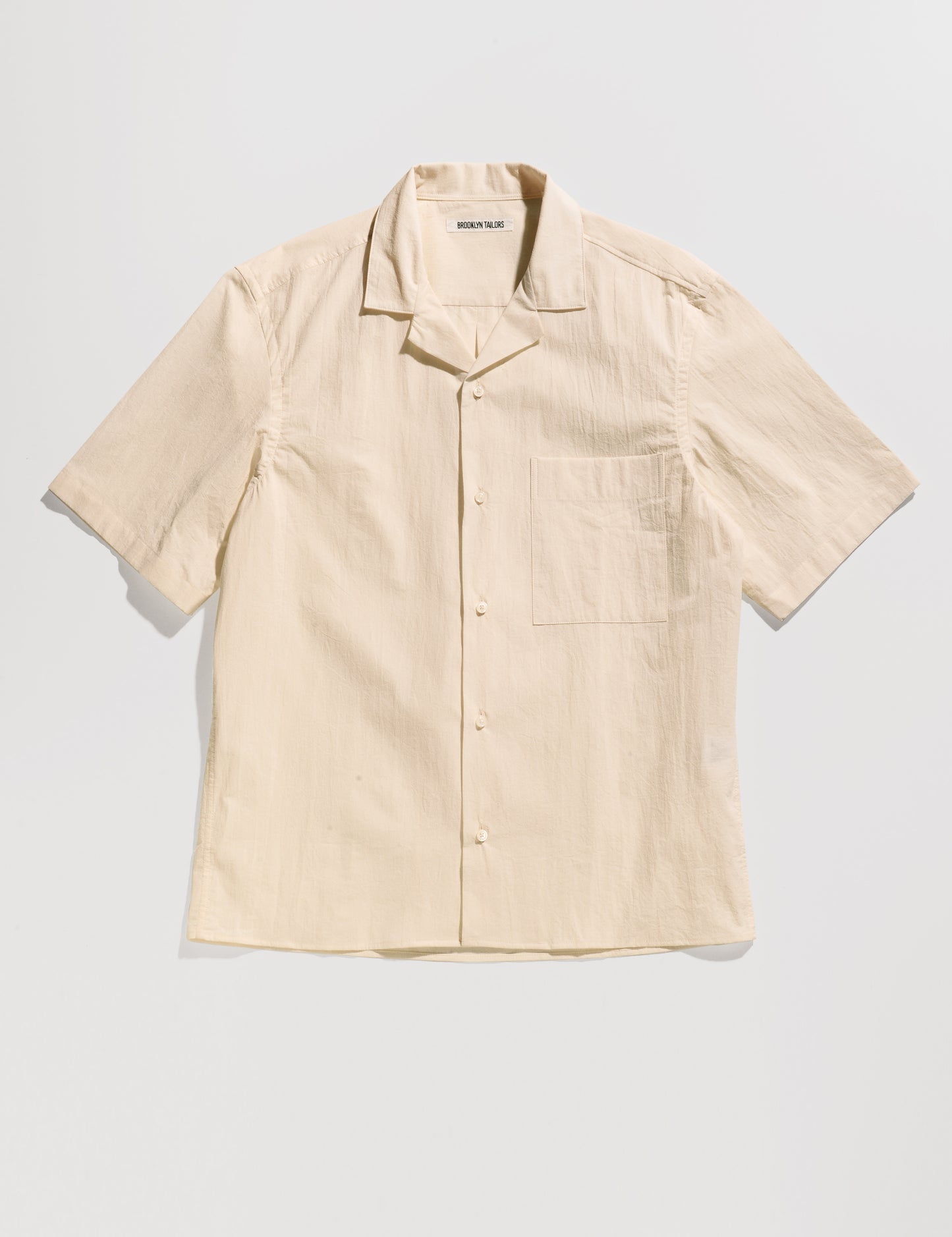 Full length flat shot of Brooklyn Tailors BKT18 Camp Shirt in Crinkled Cotton - Osso