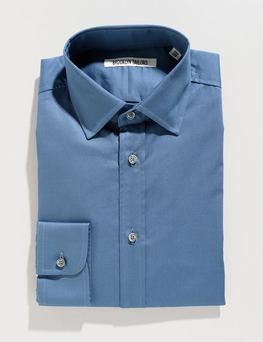 Folded flat shot of Brooklyn Tailors BKT20 Slim Dress Shirt in Smooth Pima Cotton - Delft Blue