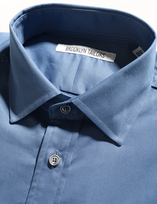 Detail shot of Brooklyn Tailors BKT20 Slim Dress Shirt in Smooth Pima Cotton - Delft Blue showing collar and buttons