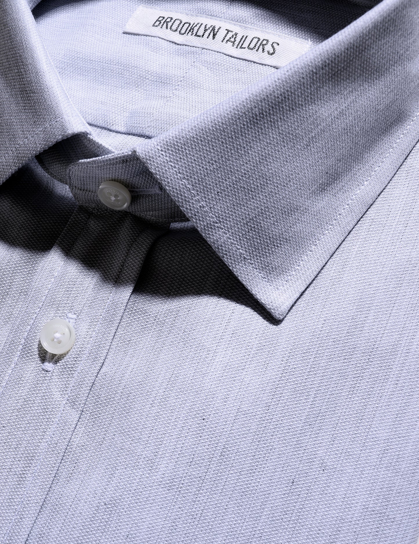 Detail shot of collar and fabric texture on Brooklyn Tailors BKT20 Slim Dress Shirt in Cotton Basketweave - Fog