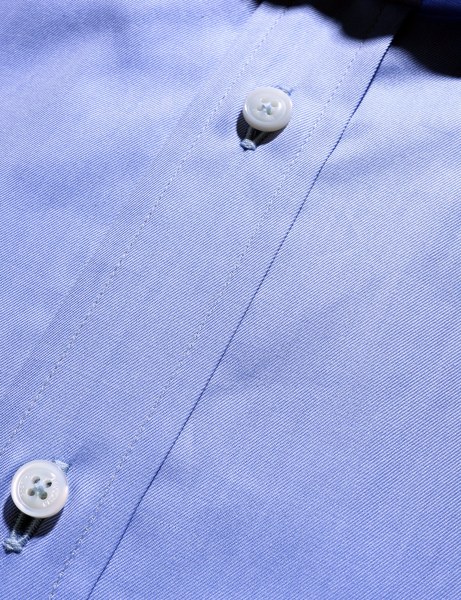 Detail shot of buttons and fabric texture of Brooklyn Tailors BKT20 Slim Dress Shirt in Cotton Twill - Blue