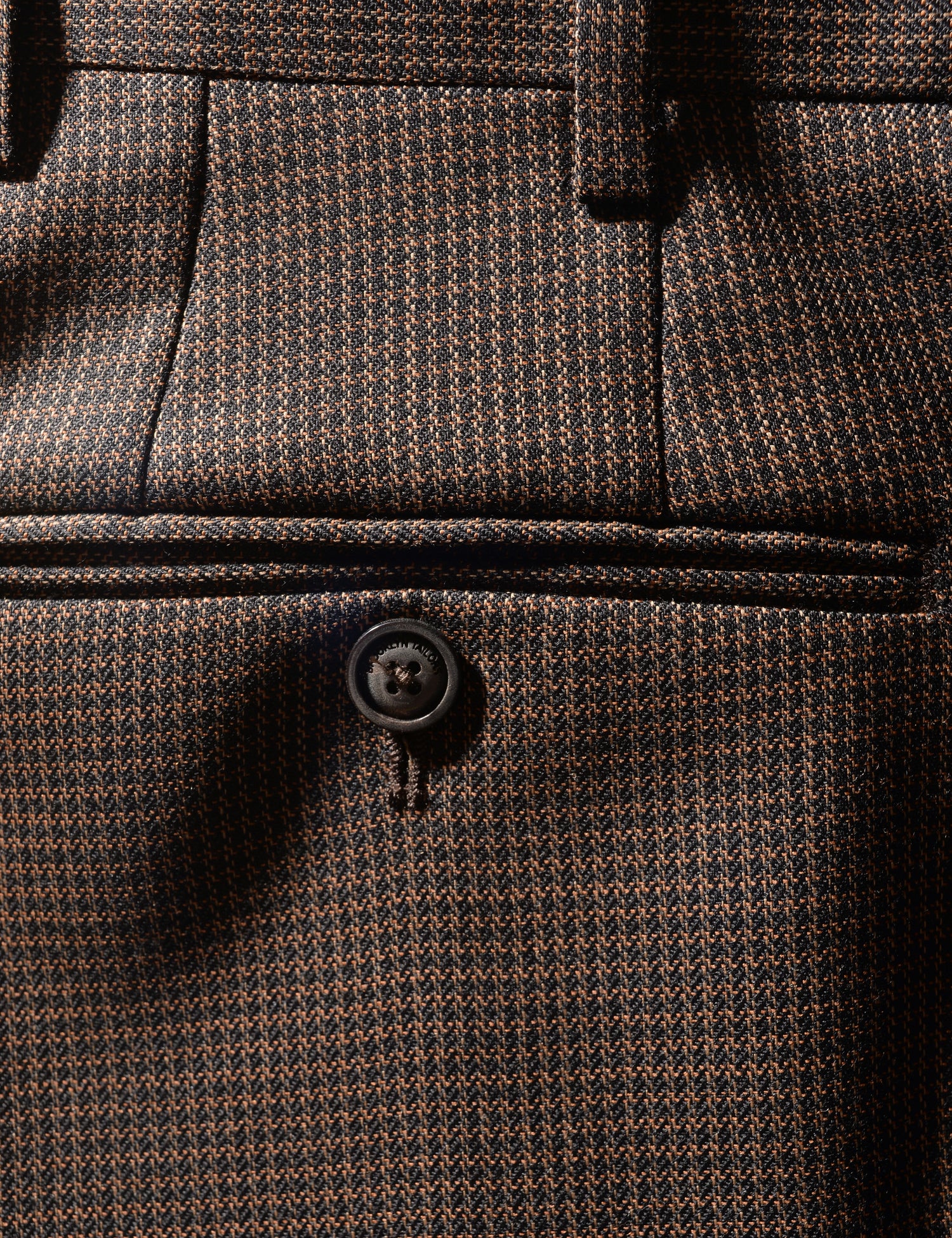 Back pocket detail shot of Brooklyn Tailors BKT36 Straight Leg Trouser in Wool Grid Weave - Blackened Earth showing back pocket, waistband, and fabric pattern