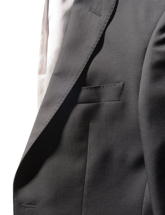 Detail shot of Brooklyn Tailors BKT50 Tailored Jacket in Super 110s Plainweave - Black showing lapel and chest pocket