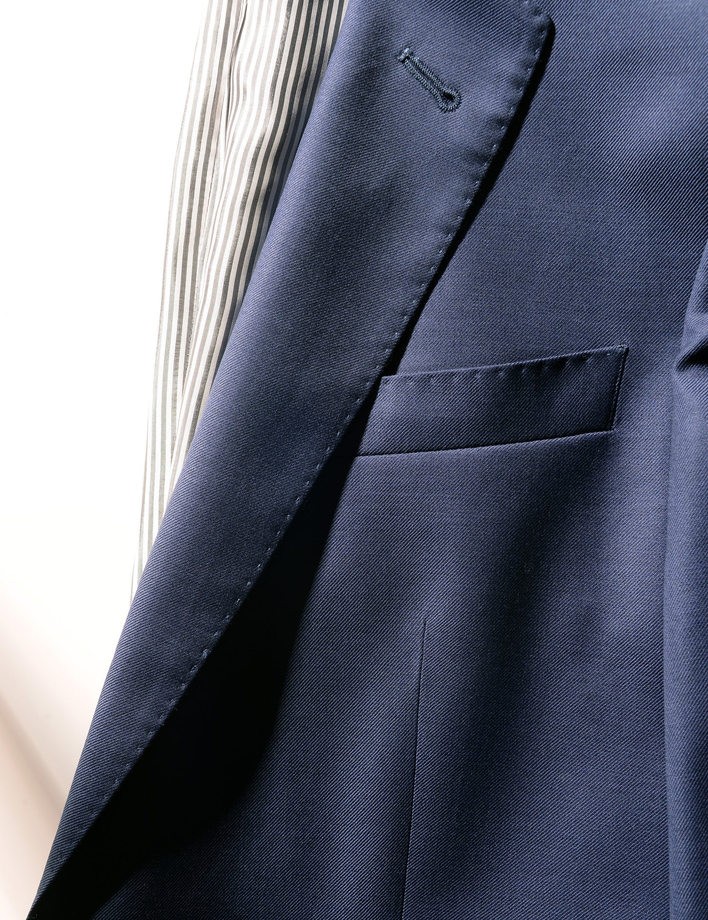 Detail shot of Brooklyn Tailors BKT50 Tailored Jacket in Super 120s Twill - Bright Navy showing lapel and chest pocket